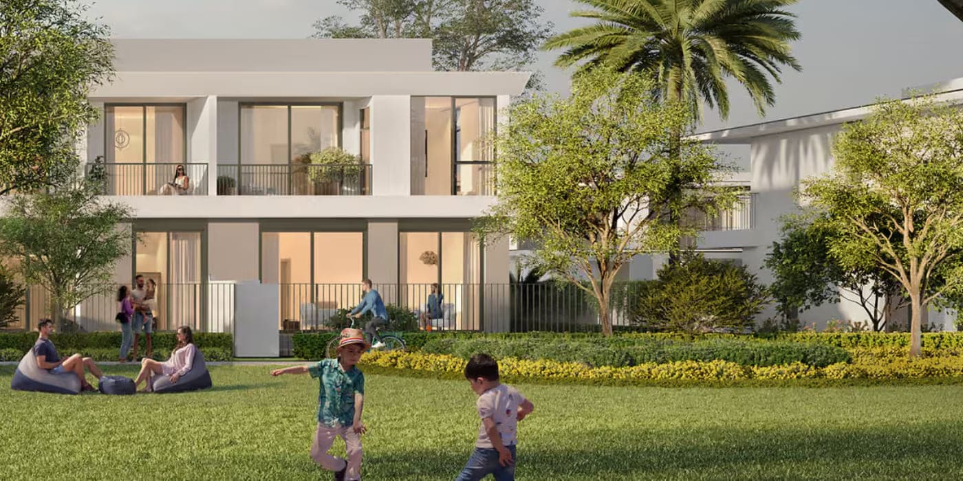 Alva at The Valley — the community lawn and shared green space between the townhouses