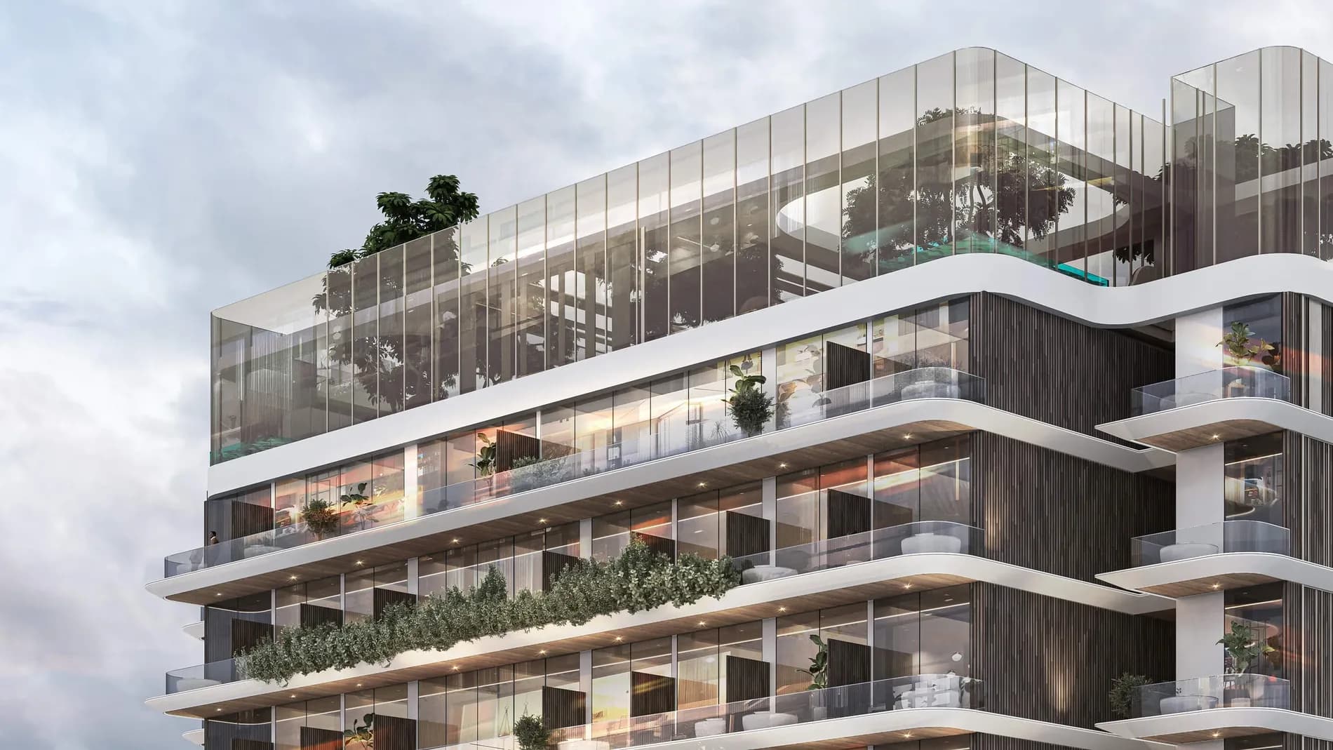 Peace Avenue — the curved facade and planted terraces at Downtown Jebel Ali