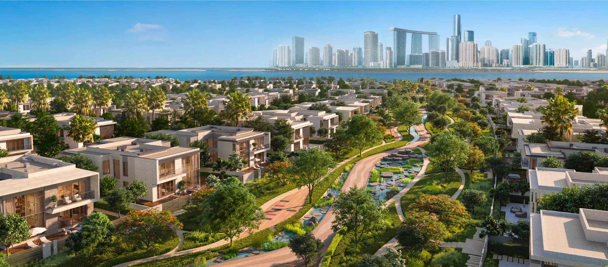 Talay at Marsa Al Saadiyat — aerial of the villas and green corridors with the Saadiyat coastline and Abu Dhabi skyline beyond